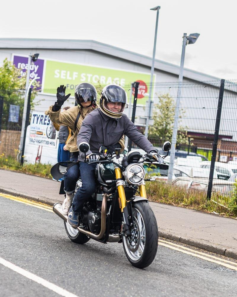 Two riders through the city